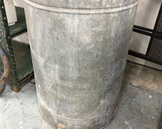 Metal barrel with spicket.