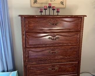 5 drawer tall chest... part of a matching bedroom set including king size headboard and frame and long dresser with mirror