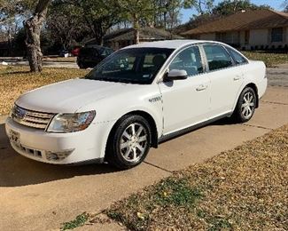 2008 Ford Taurus, 48,000 miles, CARFAX suggested retail price for this vehicle by VIN is $7590.  