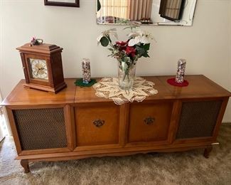 Am /FM radio, turntable stereo console unit, works ok. Asking $195.