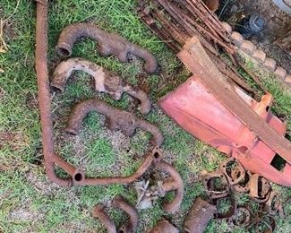 3 stock Model A 4 cylinder exhaust manifolds, 3 stock model A 4 cy intake manifolds( one with carburetor) flathead v8 exhaust tube? 