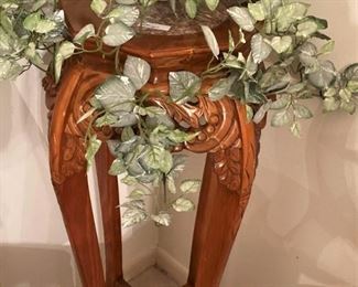 Carved plant stand
