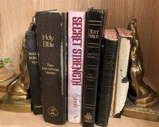 Well-used Bibles between praying hand bookends ----nice combination!
