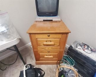 TV and VCR $15.  Oak 2 drawer file cabinet $40