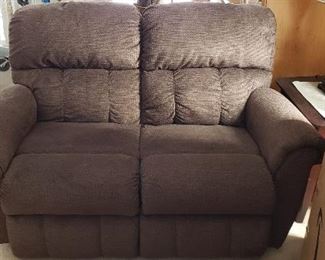 $1500  La Z Boy Briggs full power double reclining loveseat                                                                                                           42" H x 63.5" W x 40" D                                                                                     Like new condition in a rich brown color.  Matching sofa and recliner also available.                                     