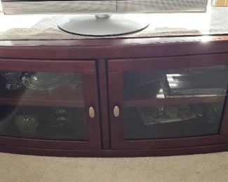 $195  Cabinet with glass doors for media or other use,