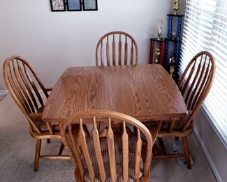$600  Amish Oak classic shaker table, 42" x 42" and 4 paddle back chairs