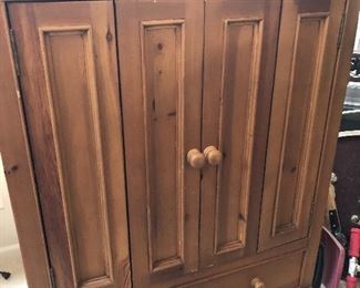 pine TV cabinet with retracting doors