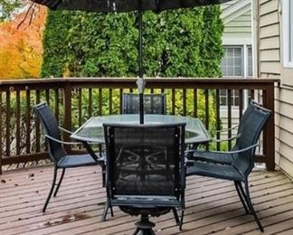 cast aluminum rectangle patio table and 5 chairs
