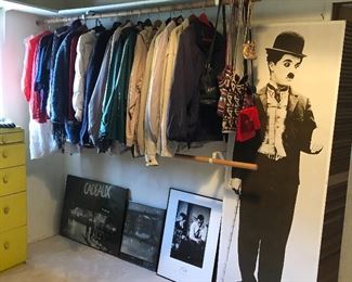 Loads of Mens Clothes and Shoes a few women's bohemian handbags, large Charlie Chaplin poster, many 80's posters still rolled up - 1982, 1983 (not seen)  Yellow wood painted Dresser. Women's Clothes additional - size small medium - not seen in the photograph