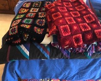 loads of afghans and quilts