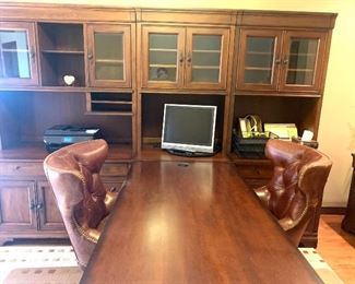 Double sided desk with attached credenza and book shelves/cabinets