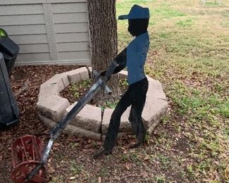 $130- Heavy iron yard art 