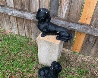 $20 each - Concrete dash hound dogs 