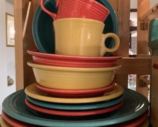 $130 - 12 piece fiesta set including three dinner plates three salad plates three bowls 2 cups and one desert  plate