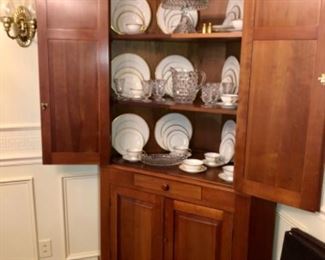Cherry Colonial House corner cupboard with T. Haviland Oxford china.