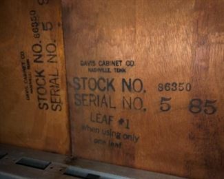 Davis cabinet co. Label for Mahogany queen Ann dining table with six side chairs and two arm chairs with plaid seats