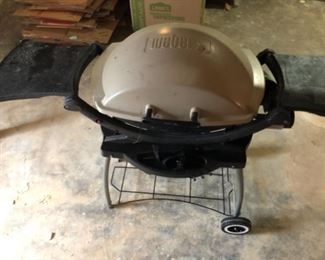 weber charcoal grill for tailgating at your next parking lot event, 