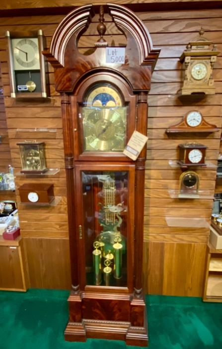 Lot 5000. $900.00 Like New Howard Miller Grandfather Clock. Beautiful wood grain. keeping great  time. This is Model 610-451 with Movement: 354044J.  Howard Miller Clocks are some of the best on the market.  Heirloom quality.  Incomparable workmanship, unsurpassed quality and a quest for perfection. It’s what Howard C. Miller insisted on when he founded the company back in 1926. Howard Miller clocks offer Quality, Selection and Value.  24" W  x  84" H  x 14.5" D Scroll down to Lot 5000 for additional photos.