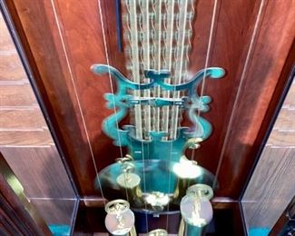 Lot 5000. $900.00 Like New Howard Miller Grandfather Clock. Beautiful wood grain. keeping great  time. This is Model 610-451 with Movement: 354044J.  Howard Miller Clocks are some of the best on the market.  Heirloom quality.  Incomparable workmanship, unsurpassed quality and a quest for perfection. It’s what Howard C. Miller insisted on when he founded the company back in 1926. Howard Miller clocks offer Quality, Selection and Value.  24" W  x  84" H  x 14.5" D