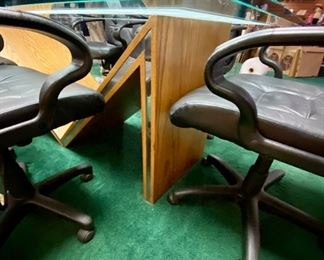Lot 5001.  $750.00  Glass Conference Table. w/oak "M" Base and Chrome Accents. So much Potential. 84"L x 42"W x 29.5"H w/ 3/4" thick glass. Very sturdy and glass in etched around the edge of the glass.  View of Base and the thickness of the glass. Chairs are sold separately in next lot.