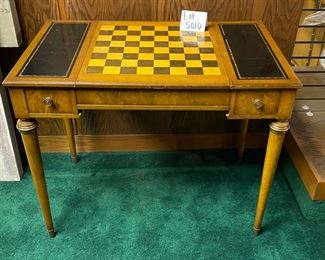 Lot 5010   $275.00  Vintage Desk, Chess and Backgammon Game table. The reversible desk and chess board top slides in and out for neat storage.  Also has two drawers 36" W x 22" D  x 29.5" H.  Great vintage game table. Needs some TLC but very good condition overall.  View of Game Table with Chess Board. 