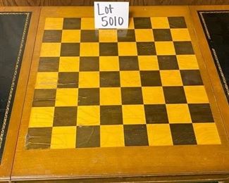 Lot 5010   $275.00  Vintage Desk, Chess and Backgammon Game table. The reversible desk and chess board top slides in and out for neat storage.  Also has two drawers 36" W x 22" D  x 29.5" H.  Great vintage game table. Needs some TLC but very good condition overall.  View of Chessboard Top.