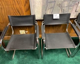 Lot 5009  $1,400.00  Set of 4 Effezeta Italian Black and Chrome Cantilever Style chairs.  Made in Italy, super mod, real cool. Slings are Leather as well as the  leather arm rests.  Chrome base is very solid. 22.5" W  x 30" H x 15" seat height x 23" front to back. Only 1 Set.