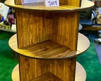 Lot 5014.  $285.00  4 Tier Circular Store display 30" Diam. x 68" H w/16 cubbies.  Great for display of products such as Lotions, Health Product, Figurines etc.