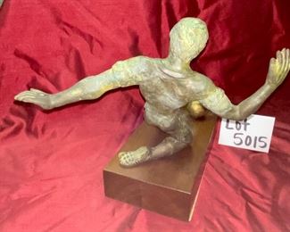 Lot 5015. $115.00  Vintage House of Goebel Patinated Metal of Man Playing Soccer.  Made in Italy with wood base	12" H x 15" W x 12" D.  Very Cool Piece. 