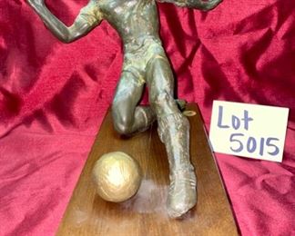 Lot 5015. $115.00  Vintage House of Goebel Patinated Metal of Man Playing Soccer.  Made in Italy with wood base	12" H x 15" W x 12" D.  Very Cool Piece. 