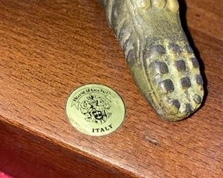 Lot 5015. $115.00  Vintage House of Goebel Patinated Metal of Man Playing Soccer.  Made in Italy with wood base	12" H x 15" W x 12" D.  Very Cool Piece. 