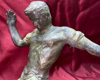 Lot 5015. $115.00  Vintage House of Goebel Patinated Metal of Man Playing Soccer.  Made in Italy with wood base	12" H x 15" W x 12" D.  Very Cool Piece. 