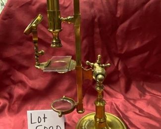 Lot 5020. $195.00  Rare Vintage Brass Reproduction Microscope, Plaque on Stand reads. William - Cary London 1790. Measures approx. 17" tall, base is 5 1/2" round. Great Condition. William Cary (1759–16 November 1825) was an English scientific-instrument maker. Trained under Jesse Ramsden, he produced numerous scientific instruments including mechanical calculators, measuring instruments, telescopes, microscopes, navigation and survey equipment.