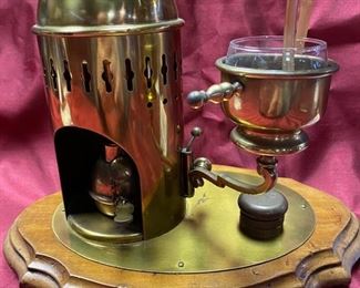 Lot 5024.  $95.00  Very Unique Miniature Brass Distiller w/ wooden base.  12" W x 9" D  x 13" H.  Very unique and  cool piece for a bar display.   