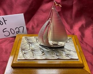 Lot 5027 $50.00 Silver-plated sailboat by Takehiko on  wood base.  6" H  x 6.8  L x  4" W.  Very Good condition overall