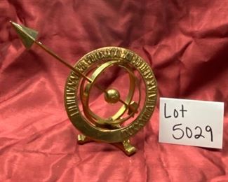 Lot 5029  $35.00  Brass Armillary Sphere, nautical themed, very cool with Roman numerals on one of the two spheres. Great Desk or Shelf display. 6"diameter, 12" arrow.