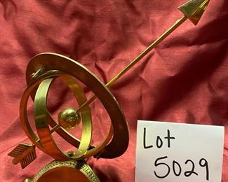 Lot 5029  $35.00  Brass Armillary Sphere, nautical themed, very cool with Roman numerals on one of the two spheres. Great Desk or Shelf display. 6"diameter, 12" arrow.