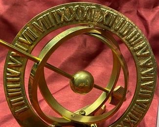 Lot 5029  $35.00  Brass Armillary Sphere, nautical themed, very cool with Roman numerals on one of the two spheres. Great Desk or Shelf display. 6"diameter, 12" arrow.