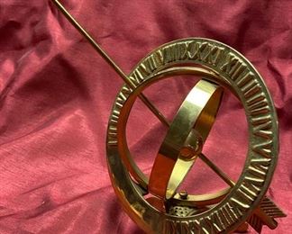 Lot 5029  $35.00  Brass Armillary Sphere, nautical themed, very cool with Roman numerals on one of the two spheres. Great Desk or Shelf display. 6"diameter, 12" arrow.