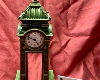 Lot 5054. $375.00. This one is Special.  Interesting and RARE KB Vintage Tower Mantle or Table Clock, marked West Germany, with four separate clocks that run in Sync for 4 different time zones.   5" W x  5" D x 14" H , this same OEM clock was made for luxury boutique Scully & Scully.  It is presently selling on ebay for $849.00. Excellent Condition.