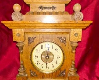 Lot 5064. $42.00. Reuge Wood Musical Alarm Clock w/Swiss musical movement Plays Mozart "Menuet - Boccherini". 15" H  x  8.5" W  x  5" D.   Used Flash to bring out details for clock in this photo.