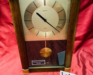 Lot 5067. $50.00.  Mid Century Seiko Quartz Strike Clock (Battery). Ref- QPL101B Cal. 12301 Japan.	10" W x 3.5" D  x 16.5" H.   Another MCM Fave and Very Rare! New Old Stock