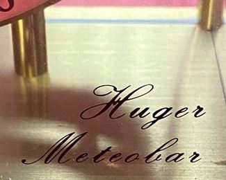 Lot 5068. $150.00.  Vintage Huger Meteobar Barometer in glass case w/brass trim. Displays in millibars vs conventional barometer face, and is more accurate as a result.   VERY HEAVY, Made with Precision in Germany  6.5" W  x  3.75" D  x 10.5" H