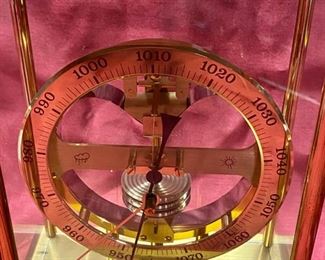 Lot 5068. $150.00.  Vintage Huger Meteobar Barometer in glass case w/brass trim. Displays in millibars vs conventional barometer face, and is more accurate as a result.   VERY HEAVY, Made with Precision in Germany  6.5" W  x  3.75" D  x 10.5" H