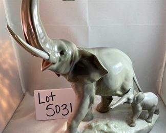 Lot 5031.  $175.00   Lladro Porcelain #1151  "Two Elephants" Mother and Calf. Figurine.  10" W base, 12" H  Mom and  2" H for Calf. Really a cool piece.  Sold on eBay for up to $275.00   Scroll down to #5031 for more photos.