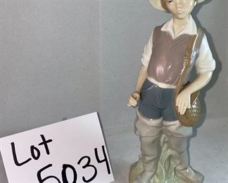 Lot 5034. $48.00 2 pc Lladro lot.  Lladro Gone Fishing, Boy with waders (missing a finger and a fishing pole #4809) and Lladro Goose "Taking Flight" excellent shape. No boxes. Sold as shown.