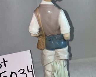 Lot 5034. $48.00 2 pc Lladro lot.  Lladro Gone Fishing, Boy with waders (missing a finger and a fishing pole #4809) and Lladro Goose "Taking Flight" excellent shape. No boxes. Sold as shown.