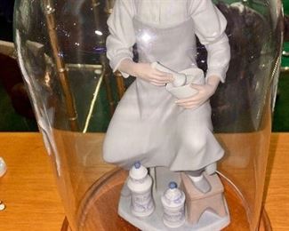Lot 5032. $275.00  Retired  Lladro Porcelain Figurine, "The Pharmacist" #4844 in Matte Finish. Also includes: Cloche case and wood base.  12.5" H x 6.5" W x 5.25 D