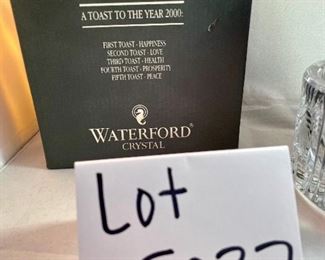 Lot 5037.  $28.00. NIB. Waterford Crystal Bottle Coaster, Millennium Collection.  5.25" h x 3"t
Retails for $115  w/box. Another nice gift! (Bottle of Wine not included)